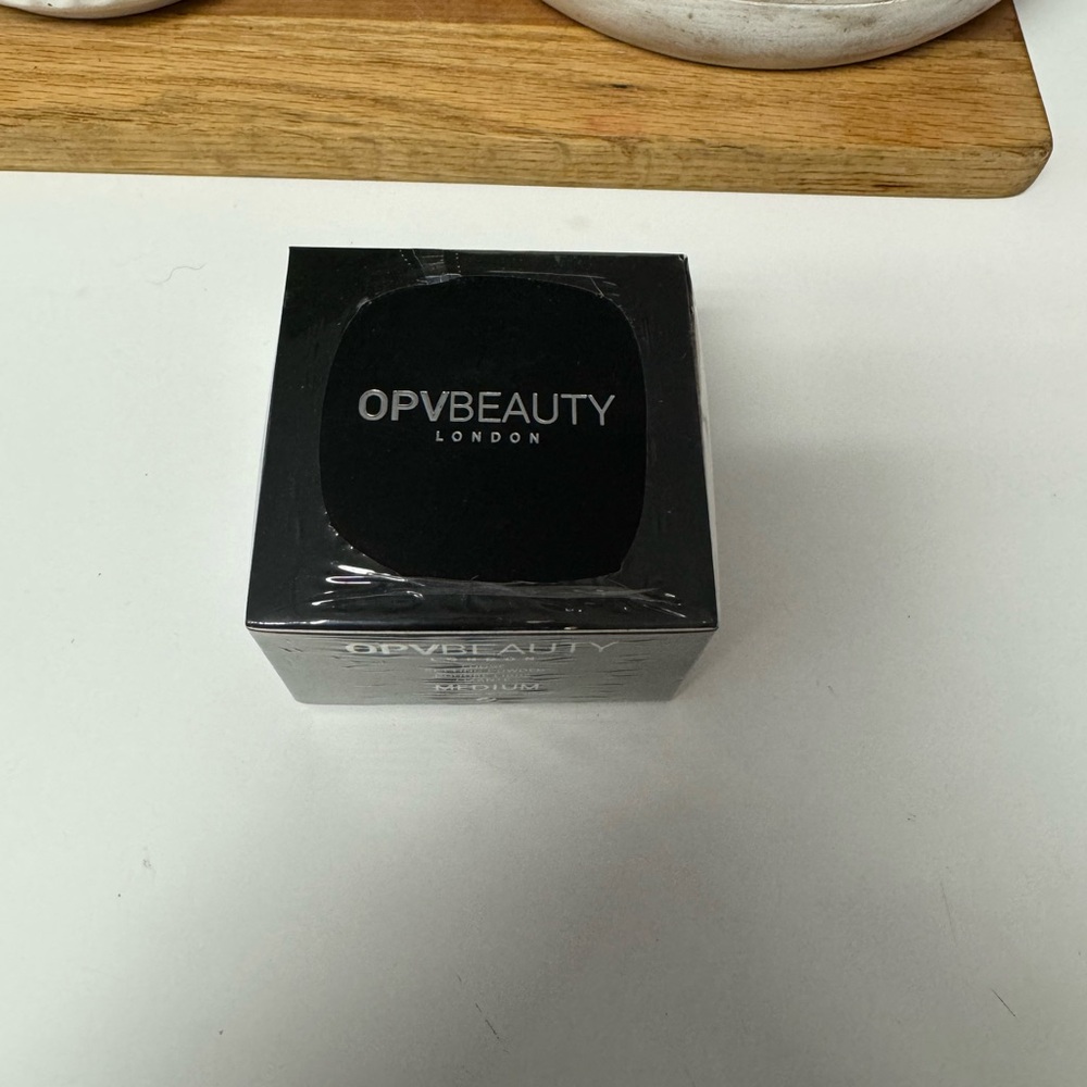 OPV Beauty London Loose Setting Powder in the color Medium